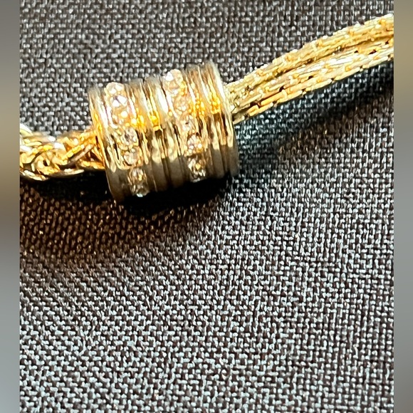 Classic and contemporary at the same time. Gold multi/tassel statement necklace - Picture 11 of 12